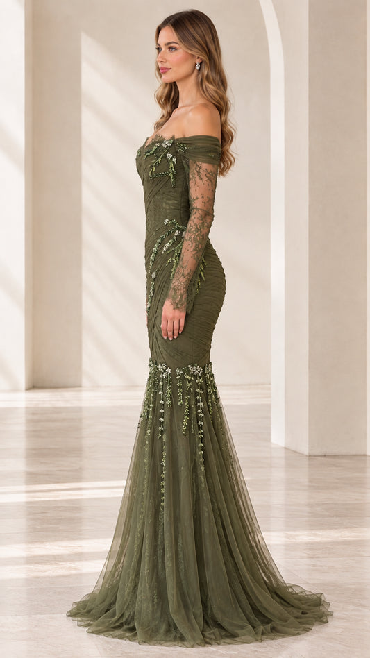 Side angle of model in long sleeve olive green trumpet evening dress