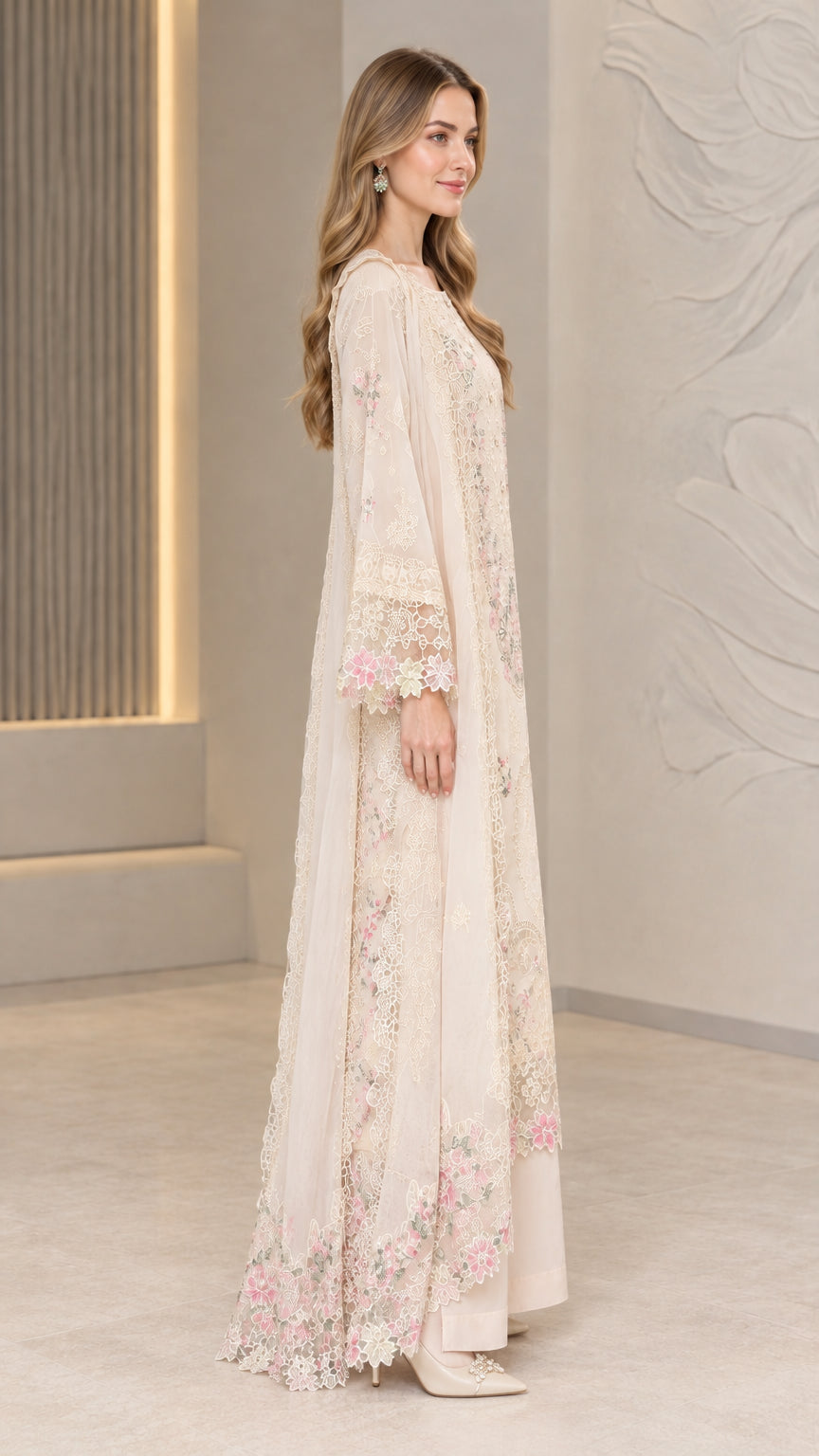 Side profile view of Ivory floral embroidered longline tunic set
