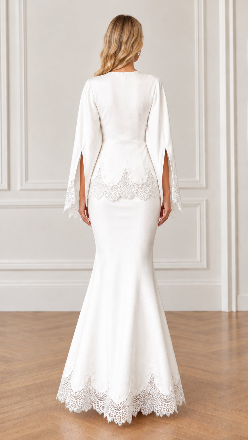 Back full-length view of white mermaid gown with lace hem and split sleeves