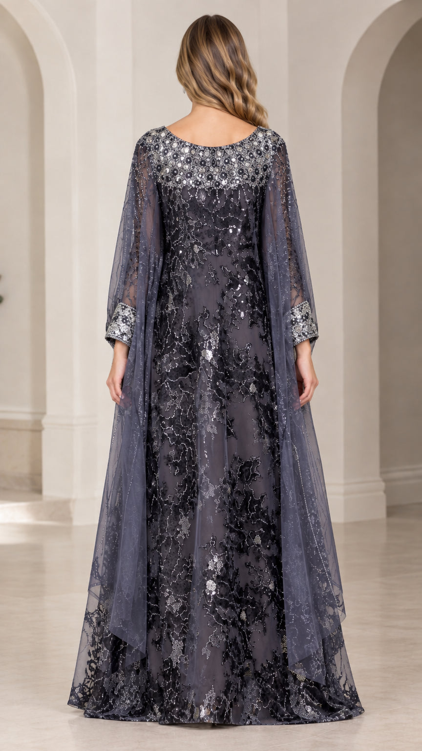Back view of charcoal grey sequin evening gown showing cascading cape