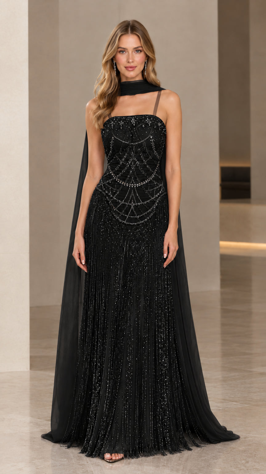 Front view of Black beaded fringe maxi formal evening gown with cape