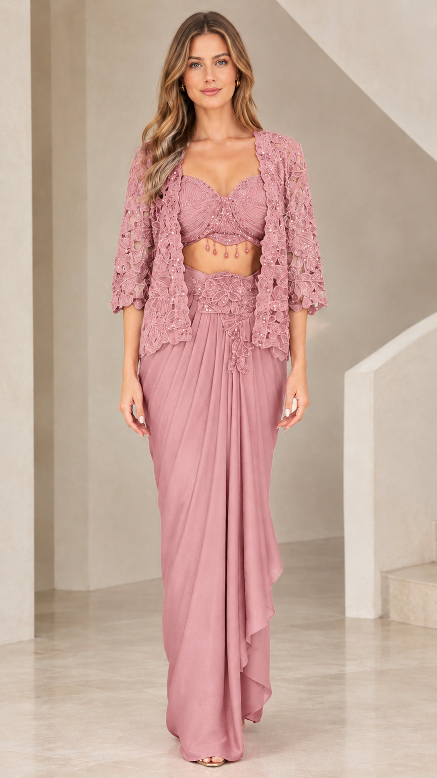Front view of woman wearing Dusty Rose 3-piece beaded bustier and draped skirt set