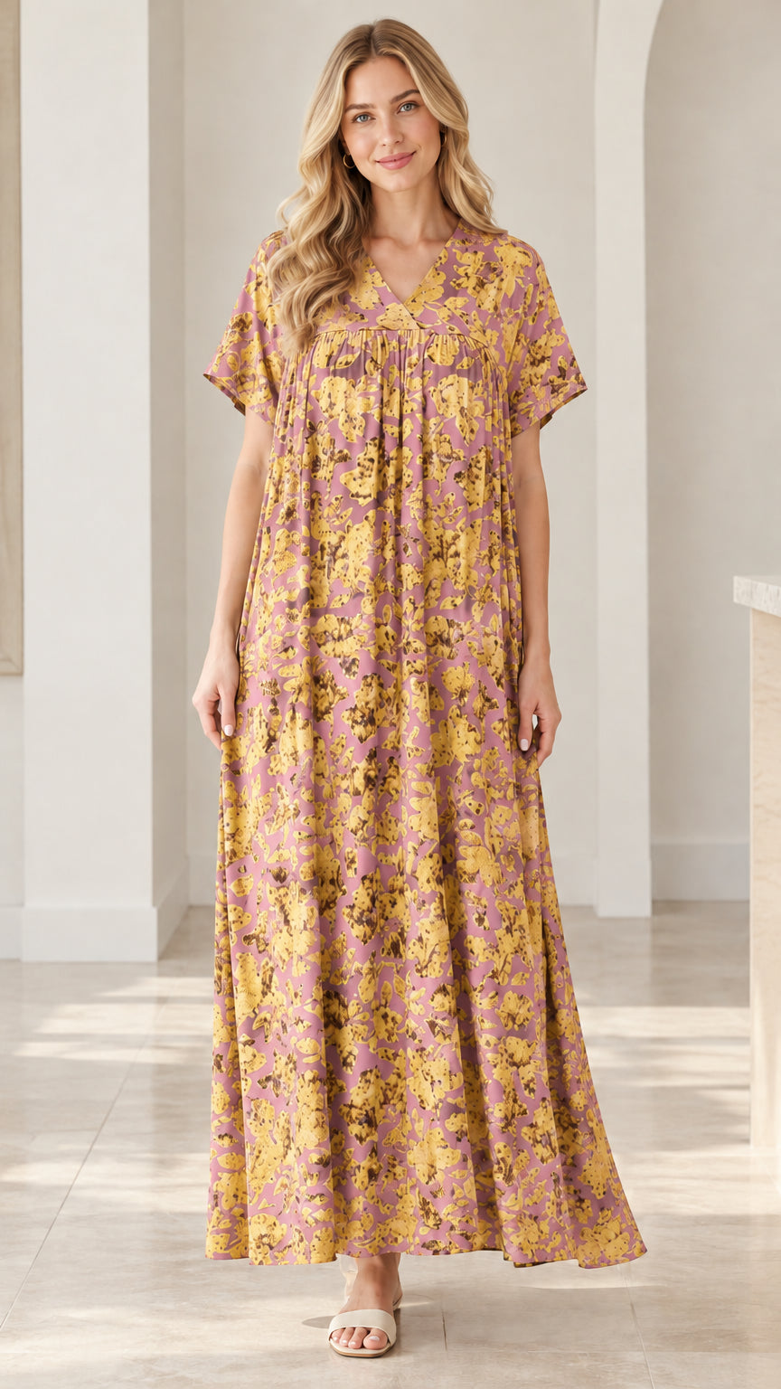 Model wearing pink and yellow floral V-neck short sleeve maxi dress