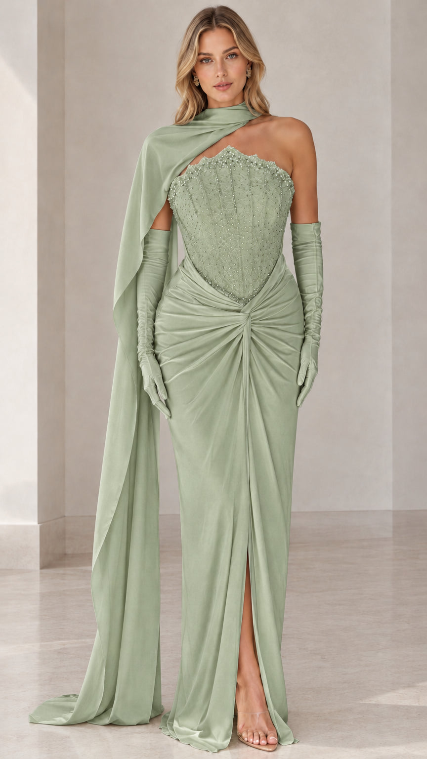 Full-length front view of sage green embellished corset evening gown with cape and gloves