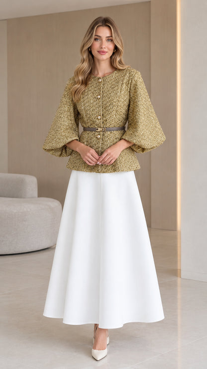 Olive green belted tweed jacket with lantern sleeves paired with white skirt - front view
