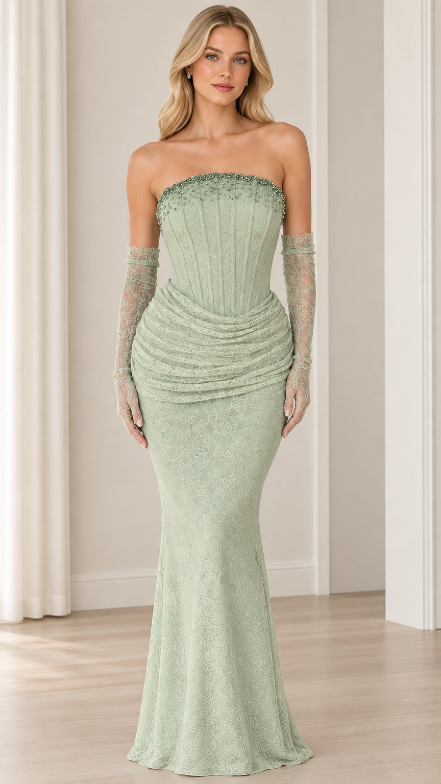 Front view of model wearing sage green strapless beaded corset lace mermaid gown with matching opera gloves
