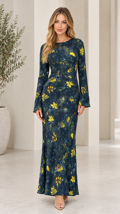 Front view of model wearing Navy Blue long flare sleeve floral maxi dress