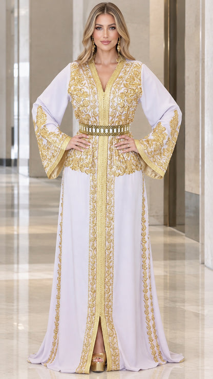 Front full view of woman wearing white Moroccan kaftan maxi dress with gold embroidery and belt