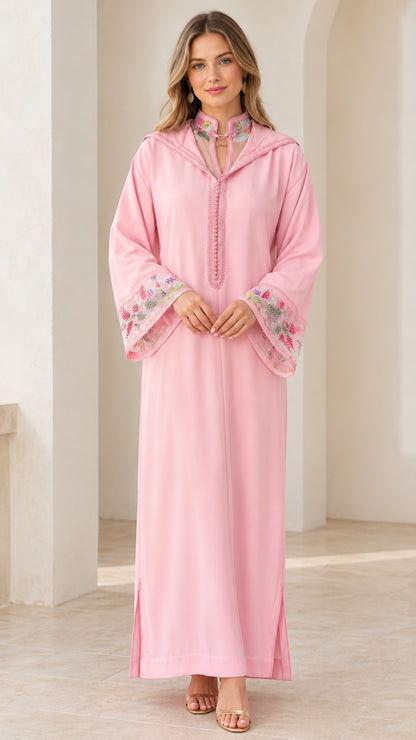 Full front view of model wearing pink embroidered hooded djellaba maxi dress