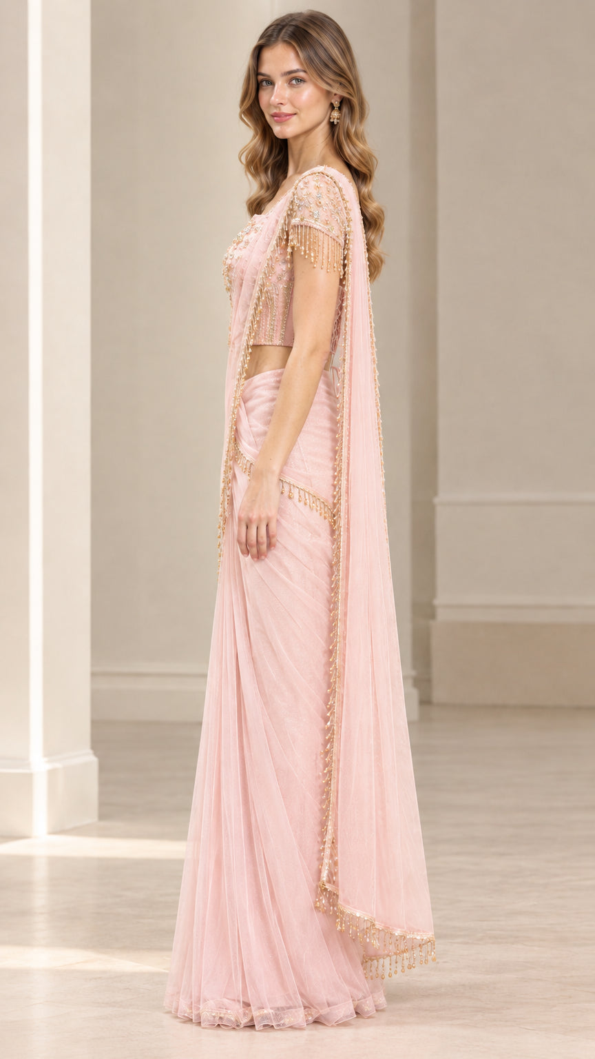 Side profile of blush pink ready-to-wear saree with flowing pallu