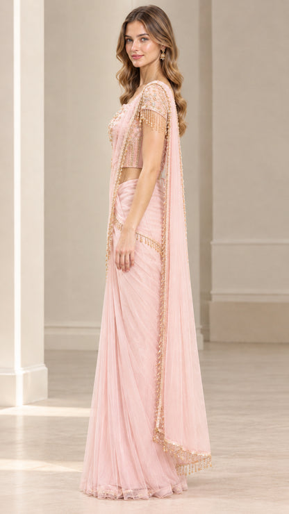 Side profile of blush pink ready-to-wear saree with flowing pallu
