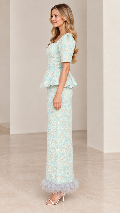 Side profile view of Ice Blue puff sleeve peplum formal dress