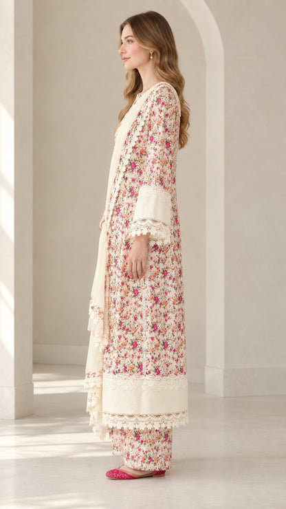 Side profile view of woman wearing Ivory floral print tunic and palazzo pant set