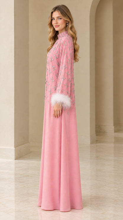 Side profile of dusty pink embellished evening maxi gown