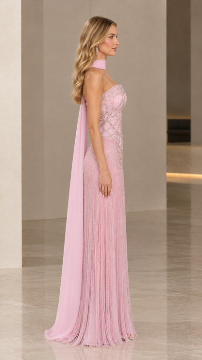Side profile view of Blush Pink beaded fringe formal gown with cape