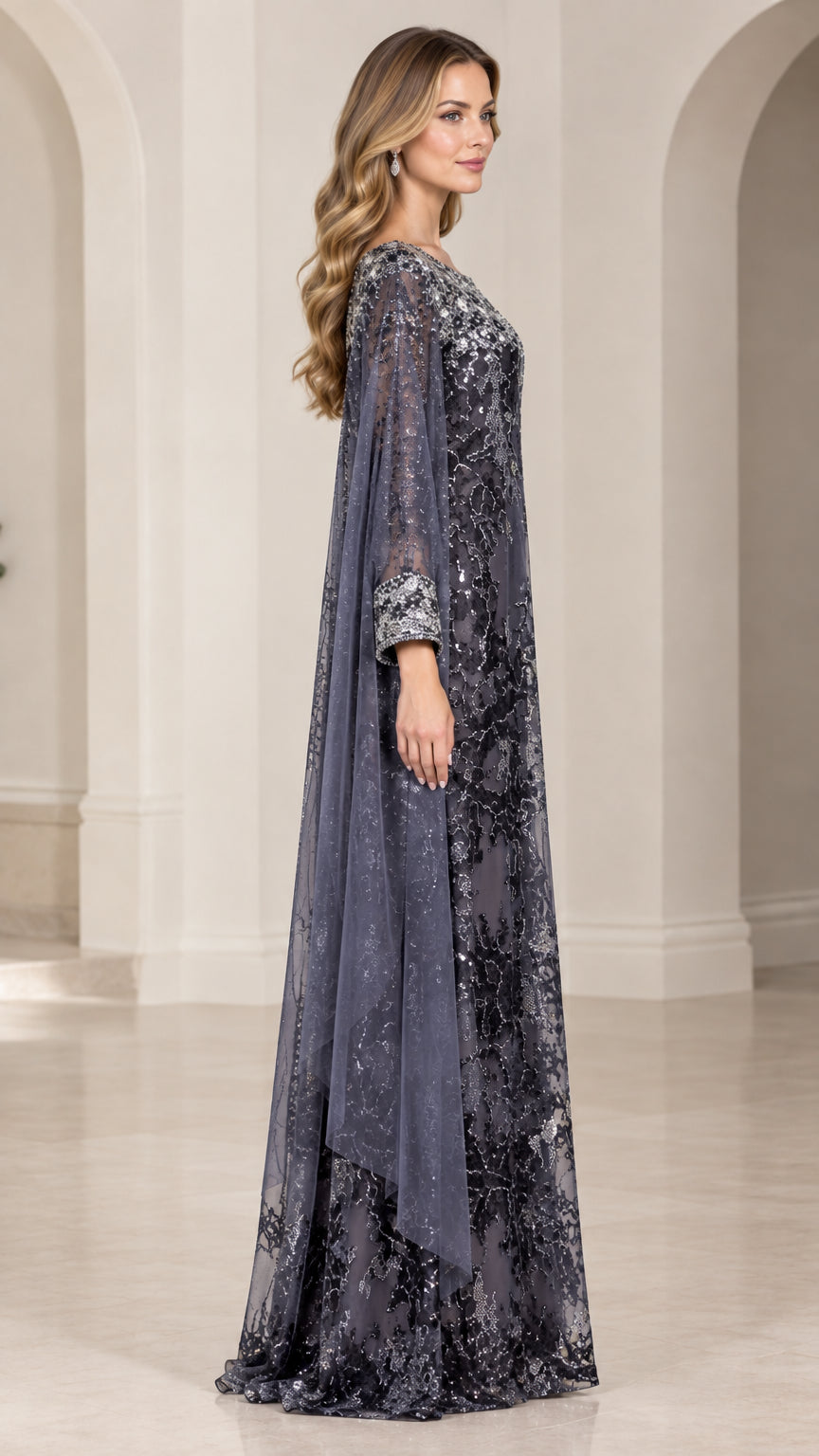 Side profile of charcoal grey sequin floor-length formal dress with cape drape
