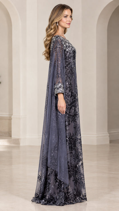Side profile of charcoal grey sequin floor-length formal dress with cape drape