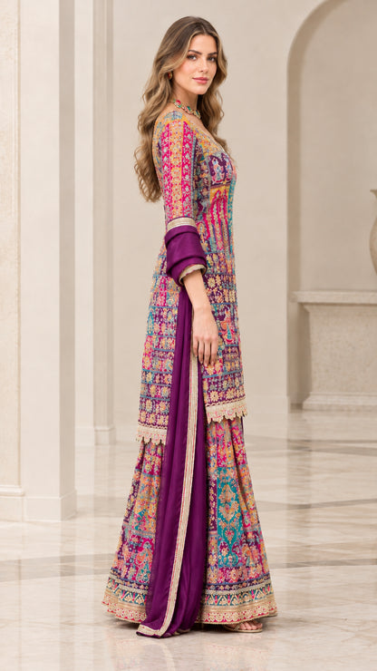 Side profile view of purple printed sharara suit set showing flare and dupatta drape