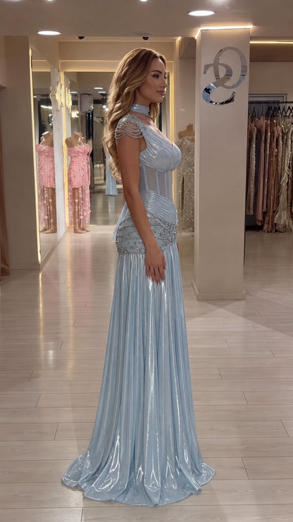 Side profile view of Ice Blue one-shoulder shimmer formal gown