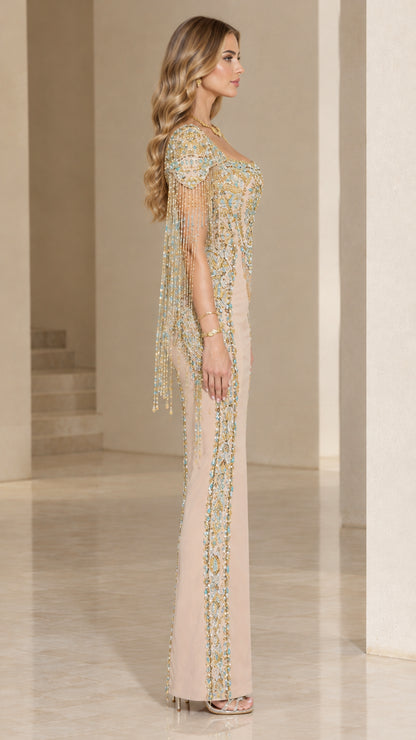 Side profile view of Champagne beaded formal maxi dress highlighting detailed fringe sleeves