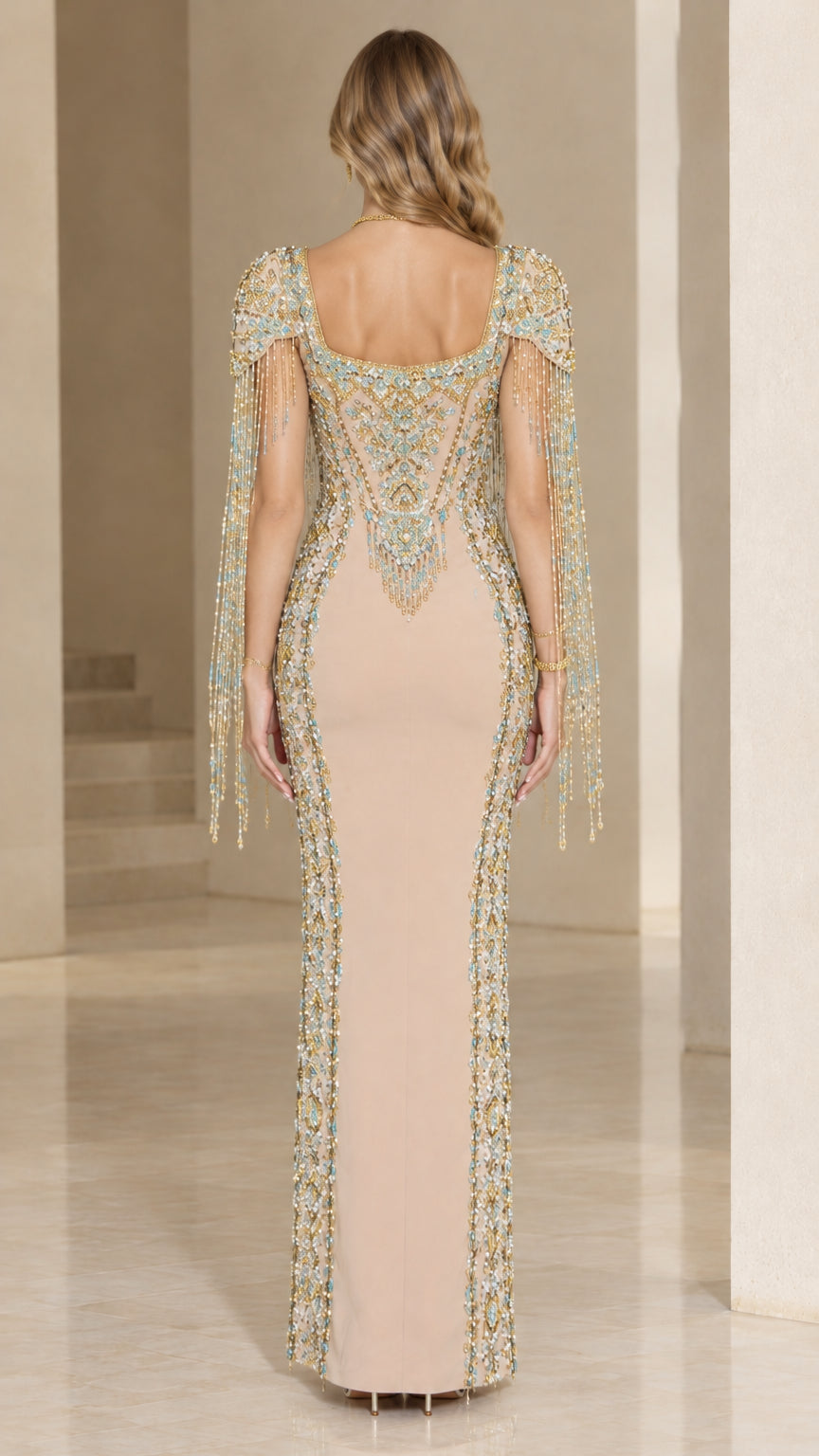 Back view of Champagne square back column gown showing vertical crystal trim
