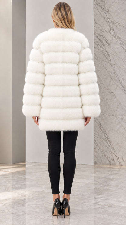 Back view of model wearing white horizontal ribbed faux fur coat