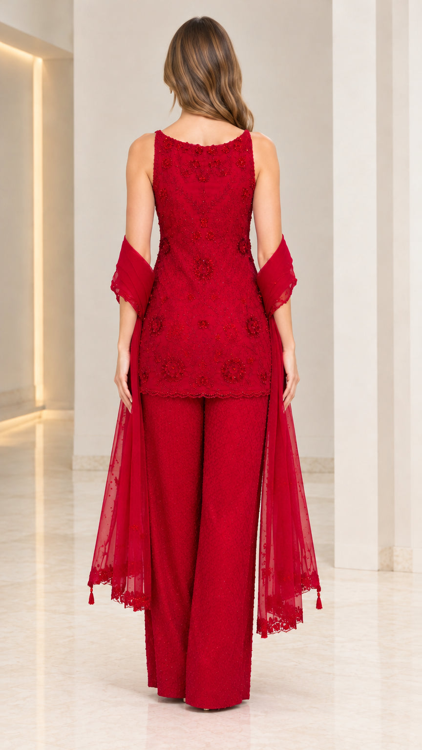 Back view of red 3-piece beaded evening pant suit with matching sheer scarf