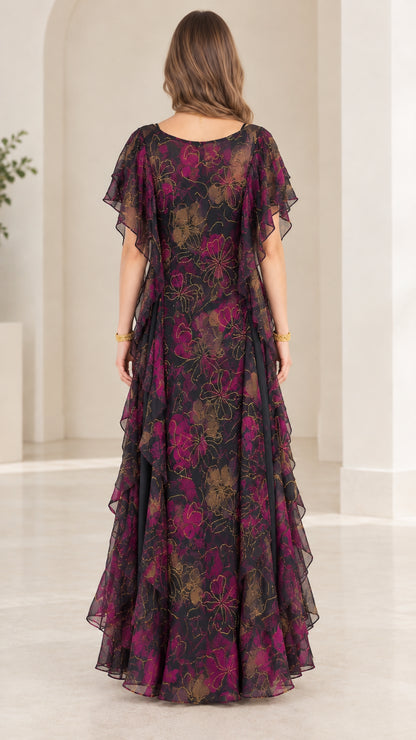 Back view of black floral chiffon maxi dress showing cascading ruffle details