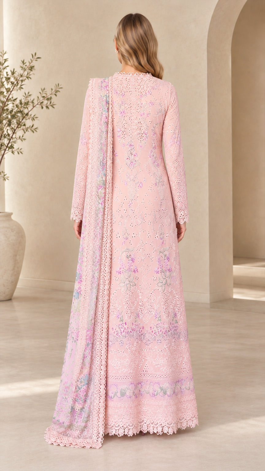 Back view of Blush Pink full-length embroidered lace dress with drape