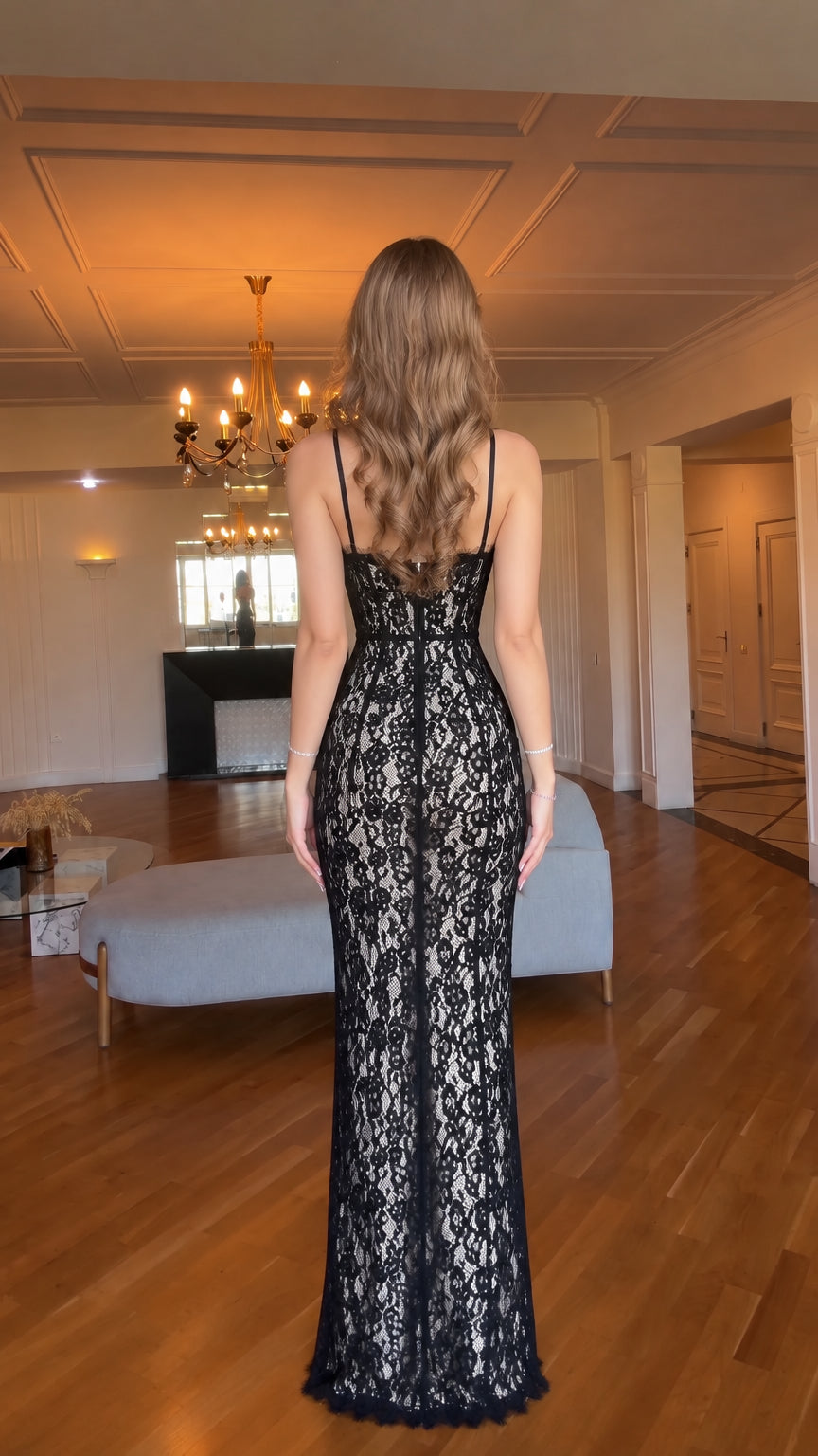 Back view of woman wearing black floral lace sweetheart evening dress