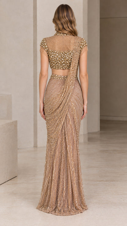 Back view of model wearing Champagne Gold sequin draped evening dress