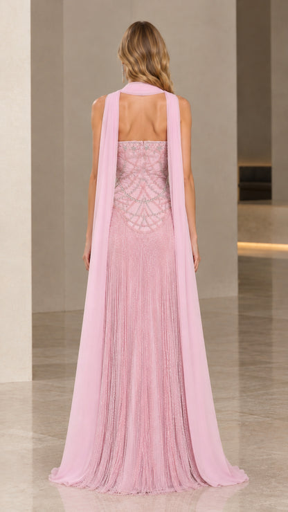 Back view of Blush Pink beaded evening gown showcasing flowing cape