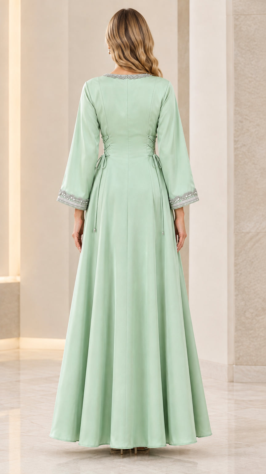 Sage green maxi dress back view featuring corset lace-up waist detail