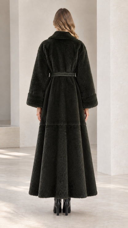 Back view of dark green belted faux fur maxi coat