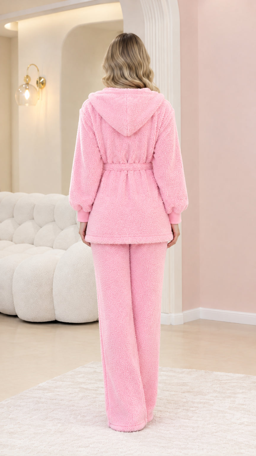 Back view of woman showing hood and waistband of pink fleece lounge set