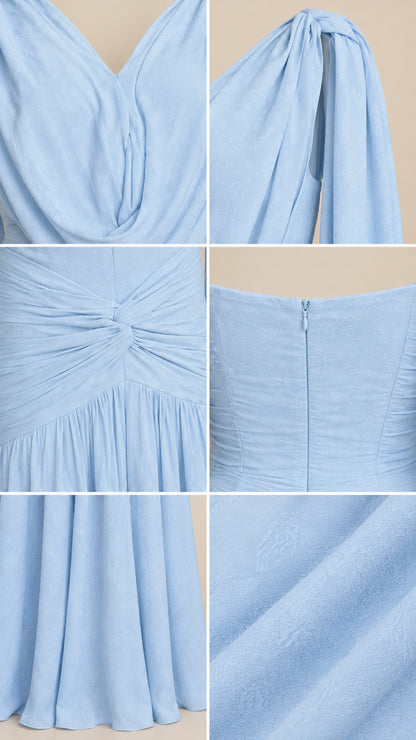 Fabric and stitching details of light blue ruched cowl evening gown