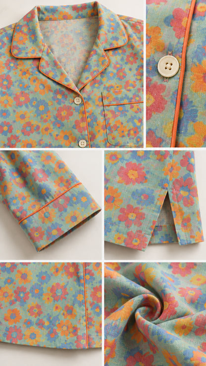 Close-up details of collar piping, button closure, cuff trim, and hem split on floral pajama set