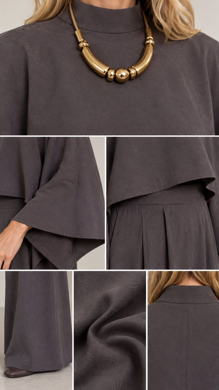 Close-up details of collar, cape sleeves, waist pleats, and fabric texture on charcoal grey matching set