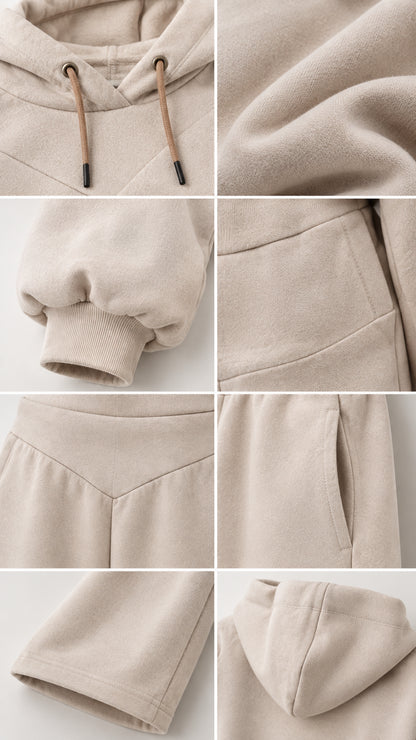 Close-up details of hood drawstring, fabric texture, sleeve cuffs, and pockets