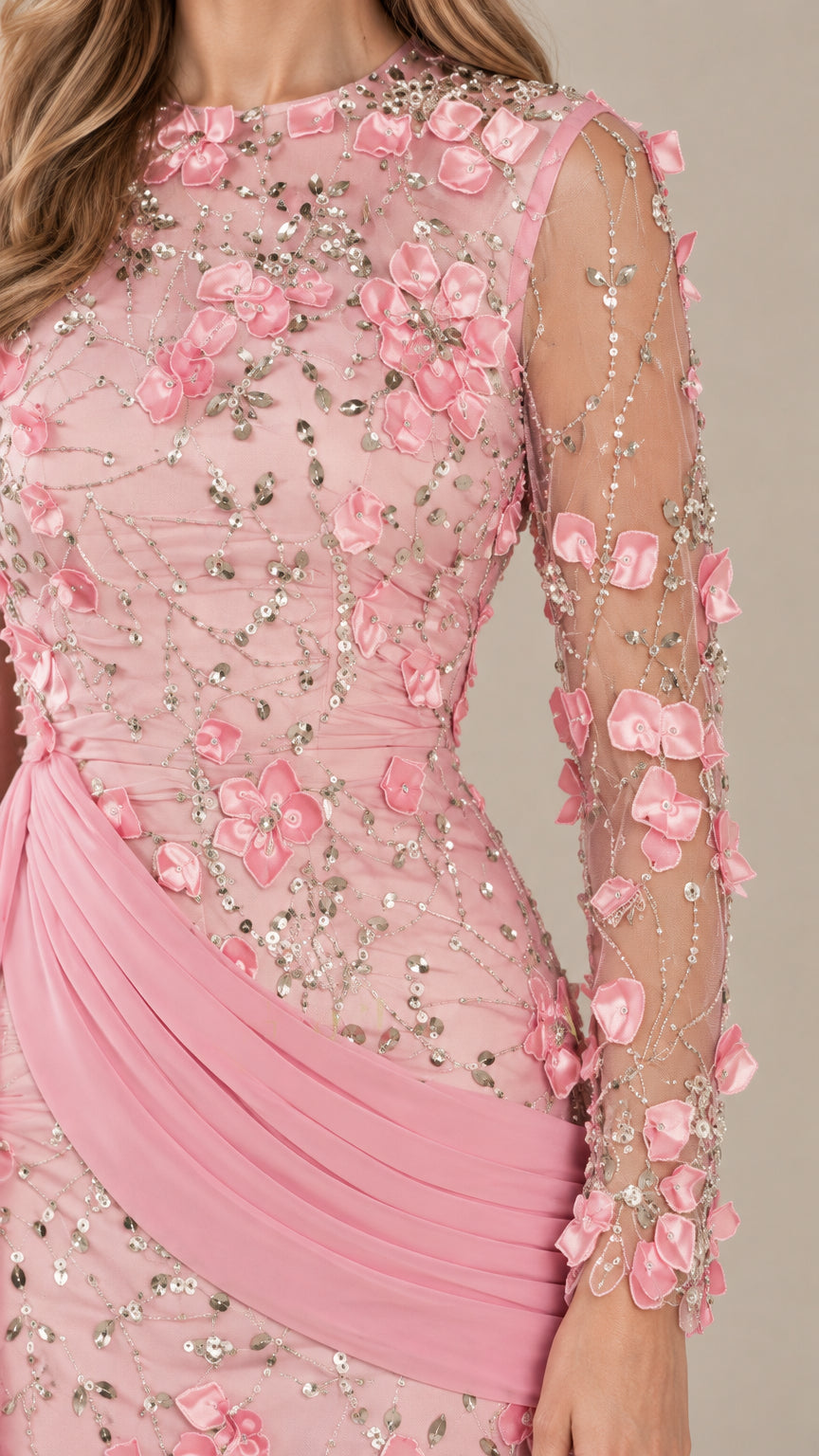 Close-up detail of 3D floral petals, sequin beading, jewel neckline, and draped waist sash