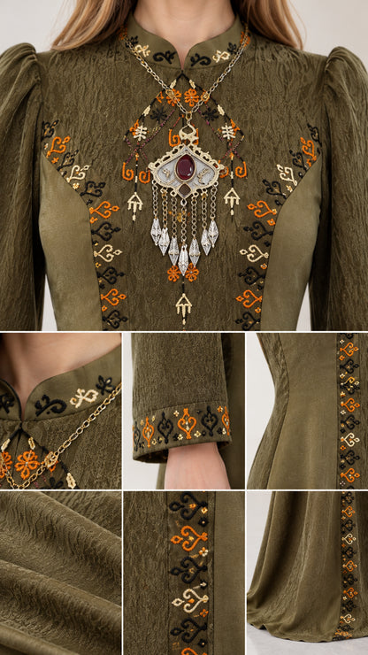 Close-up details of bodice embroidery, collar buttons, textured fabric, and cuffs