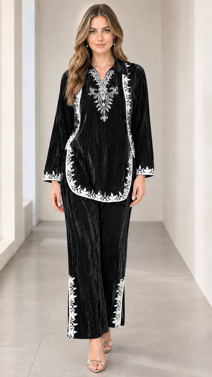 Black crushed velvet two-piece set with intricate white embroidery