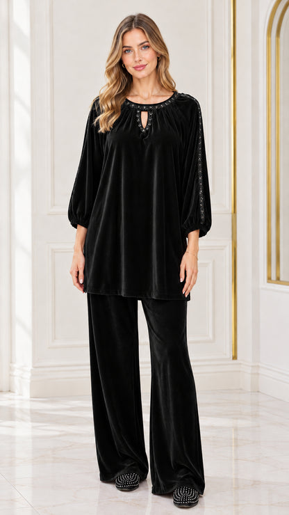 Front view of woman wearing Black velvet 2-piece set