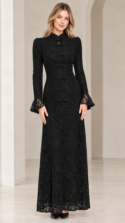 Front view of model wearing black floral lace maxi evening gown