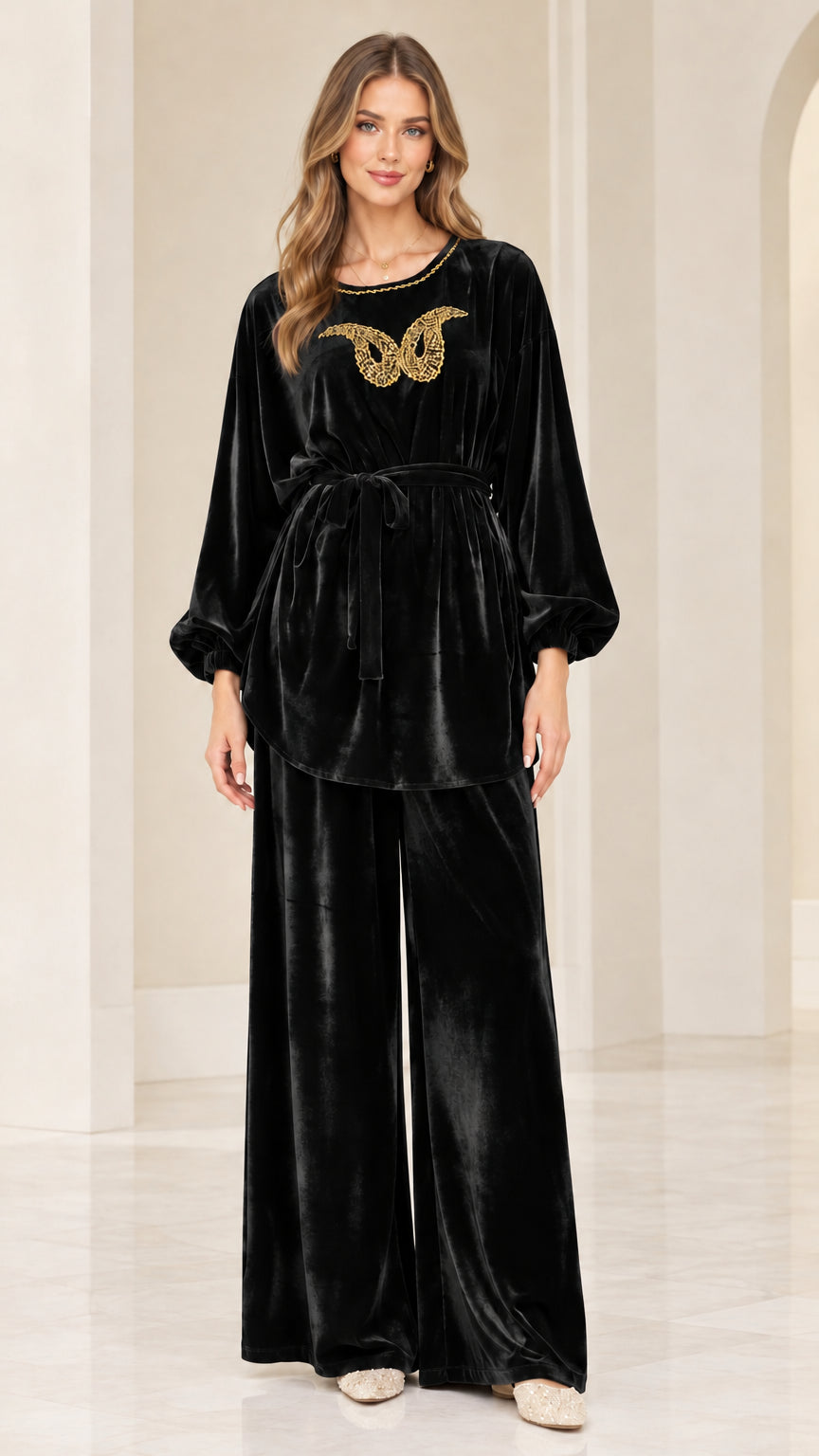 Front view of black velvet embellished matching two piece pants set
