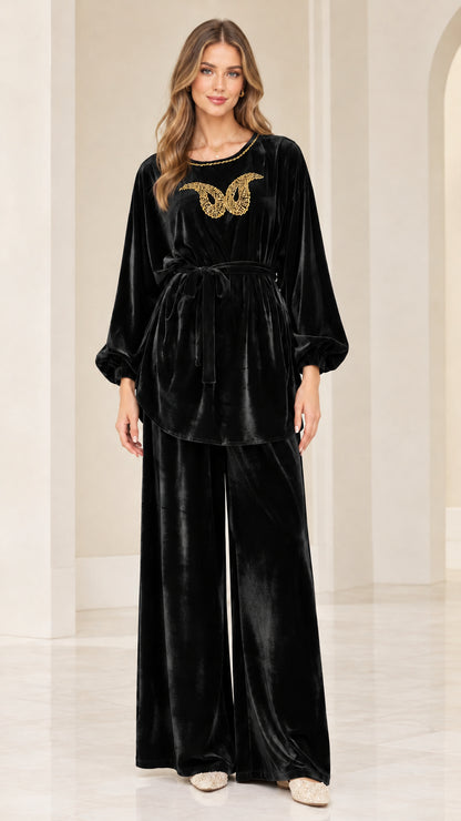 Front view of black velvet embellished matching two piece pants set