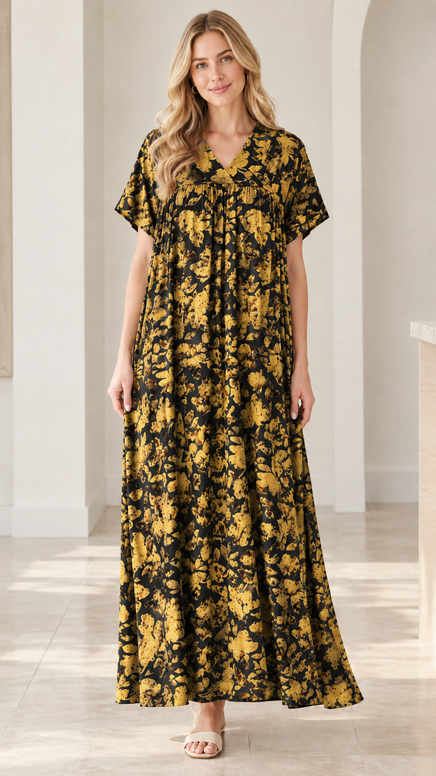 Model wearing black and yellow floral V-neck short sleeve maxi dress