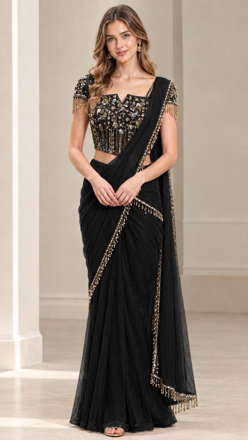 Full front view of black pre-draped saree set with embellished corset