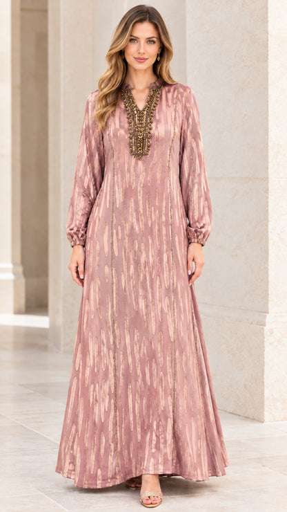 Front view of woman wearing Dusty Rose metallic brushstroke maxi dress