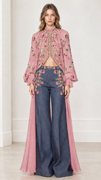 Front view of dusty pink sheer embroidered cape top with wide-leg pants